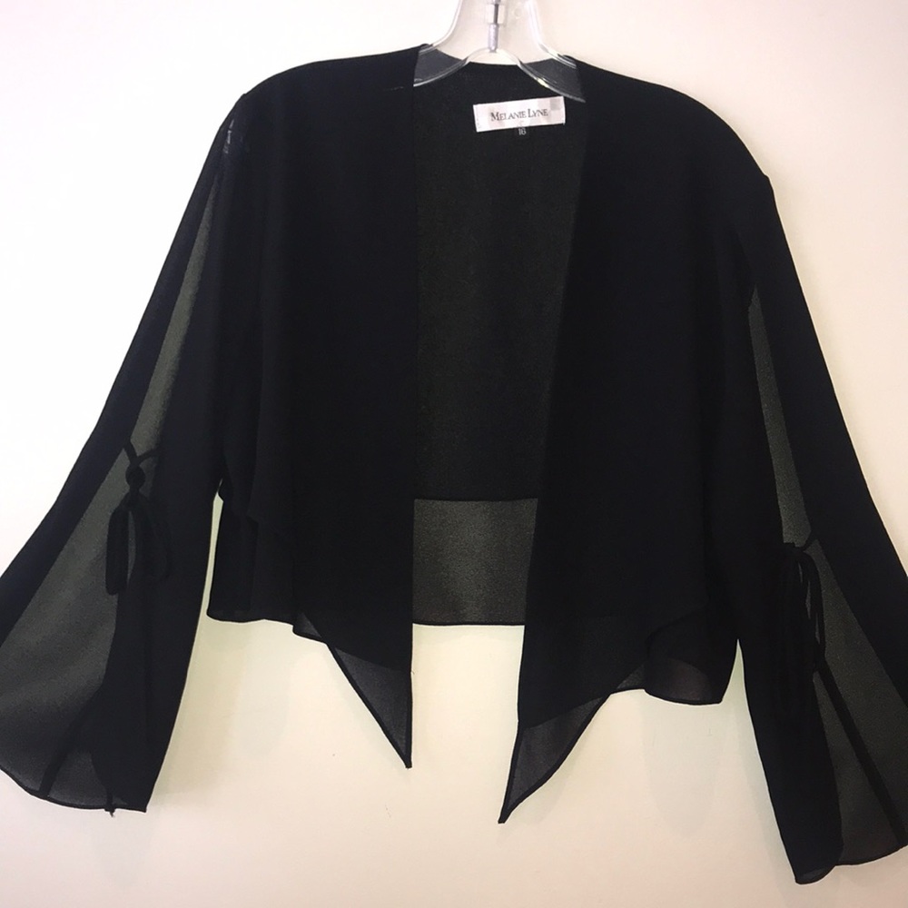 Sheer jacket with slits on the arms